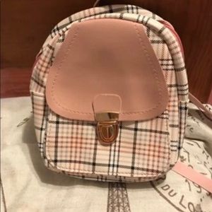 Cute push lock backpack never used